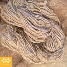 Load image into Gallery viewer, Hand-carded Hemp-llama Weasel-Wound Hand-spun Roving Top (50gm - 240 feet Skein)